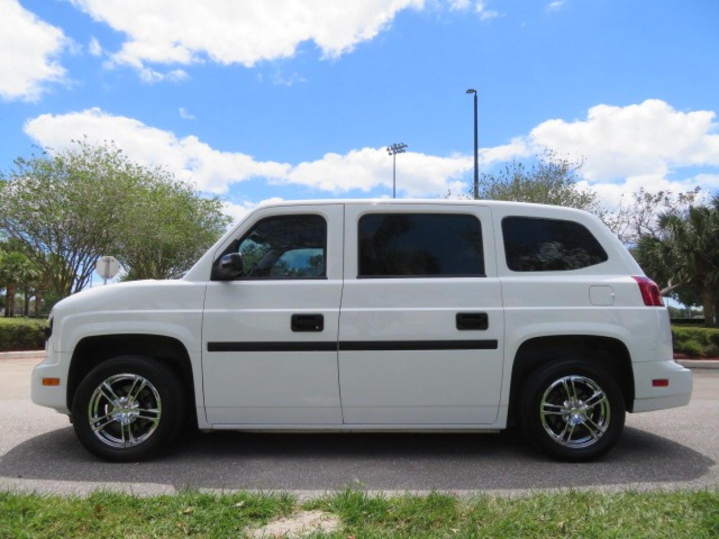 2012 White /Black with an 4.6L V8 engine, Automatic transmission, located at 4301 Oak Circle #19, Boca Raton, FL, 33431, (954) 561-2499, 26.388861, -80.084038 - You are looking at a Gorgeous 2012 Mobility Ventures MV1 Handicap Wheelchair Conversion Van with 64K Original Miles, 4.6L Ford V8, Bleack Leather Type Interior, Alloy Wheels, Power Side Entry Wheelchair Lift with Long Ramp and Short Ramp Function, Q Lock 150 EZ Lock, L-Track Tie Down System, Back Up - Photo#13